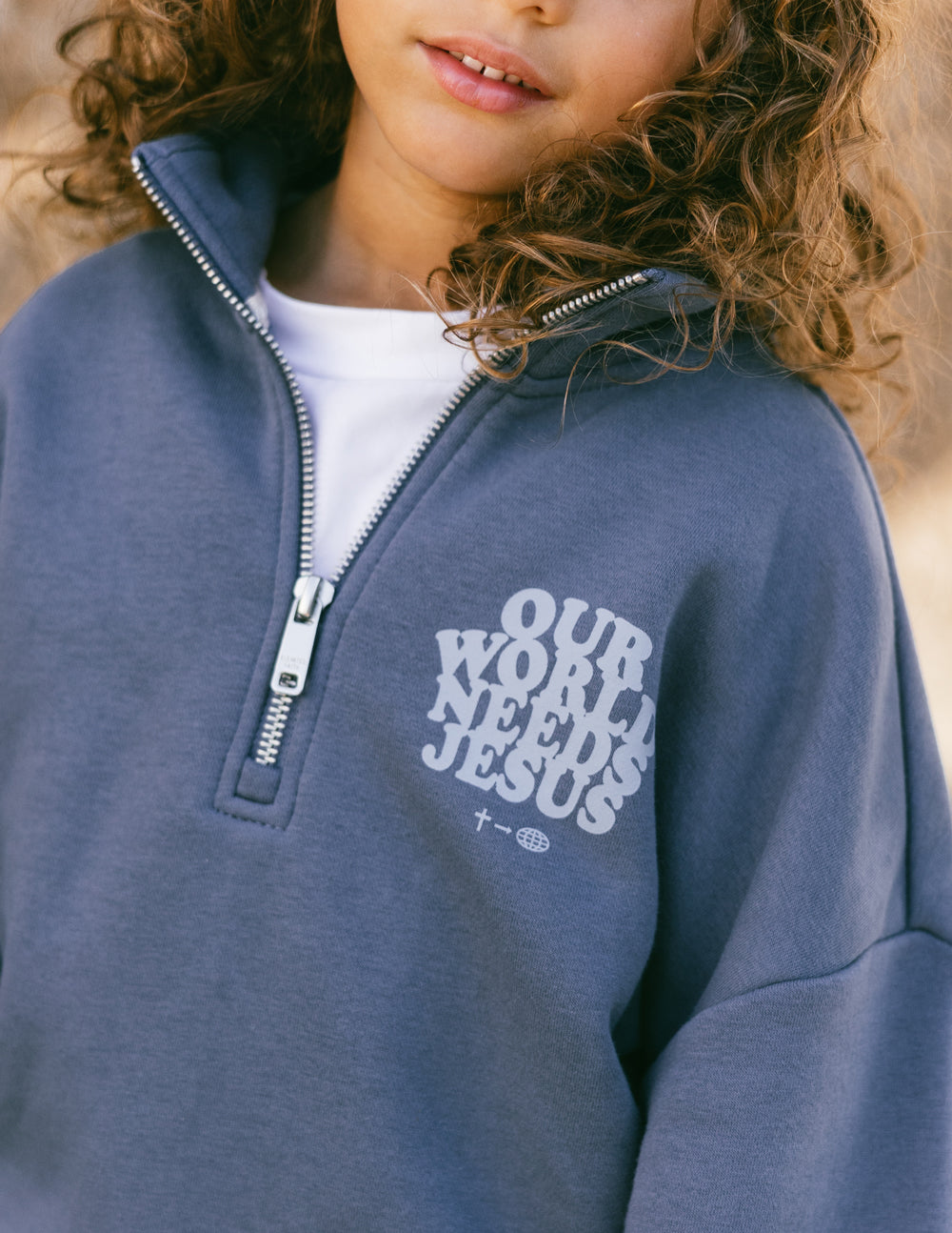 Our World Needs Jesus Kids Half-Zip 6Y
